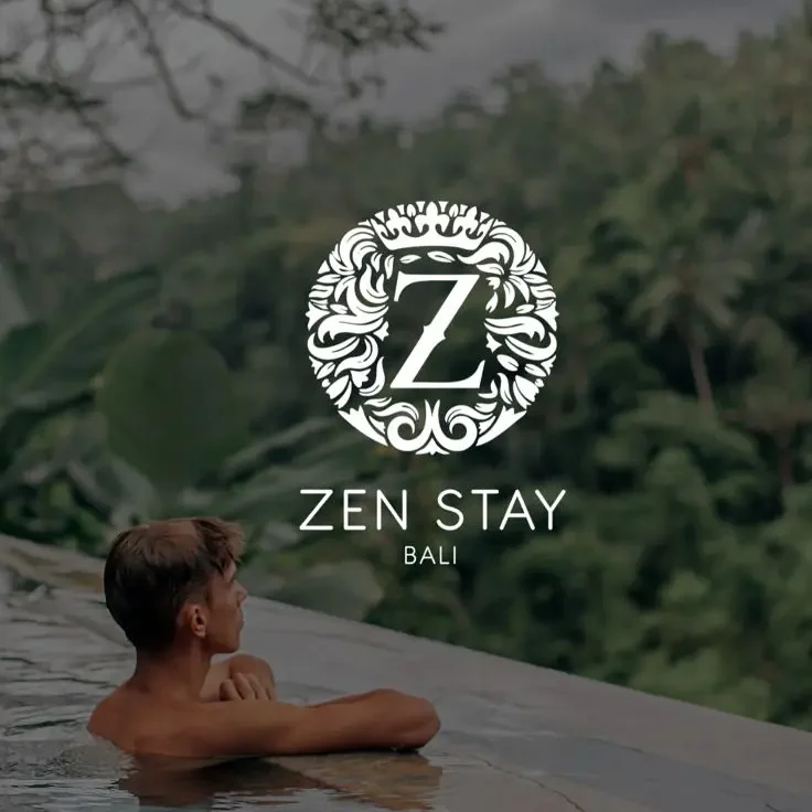 Zen Stay Bali logo overlay on a premium infinity pool visual with a guest enjoying the jungle view in Ubud